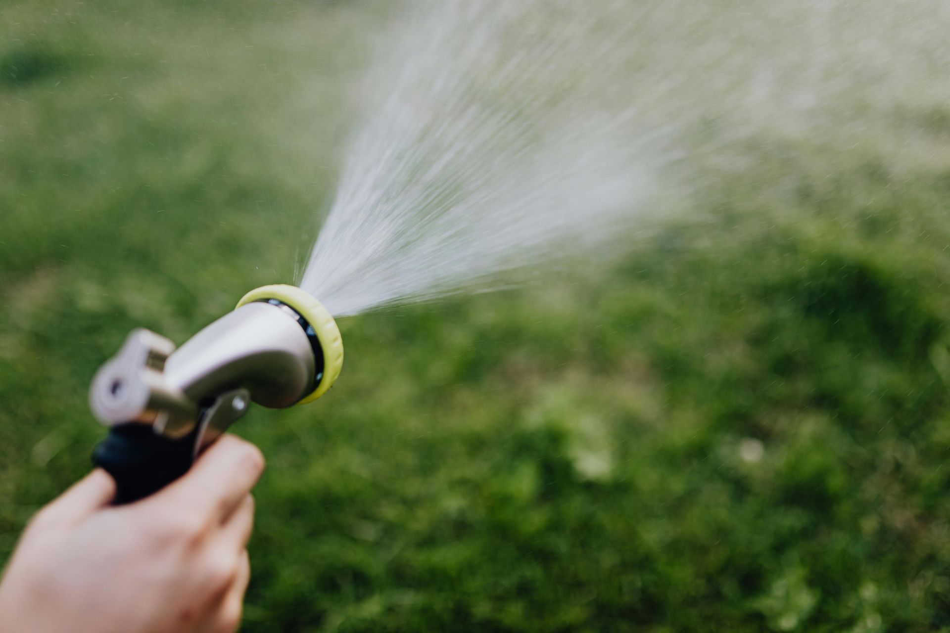 Pressure washing a concrete surface